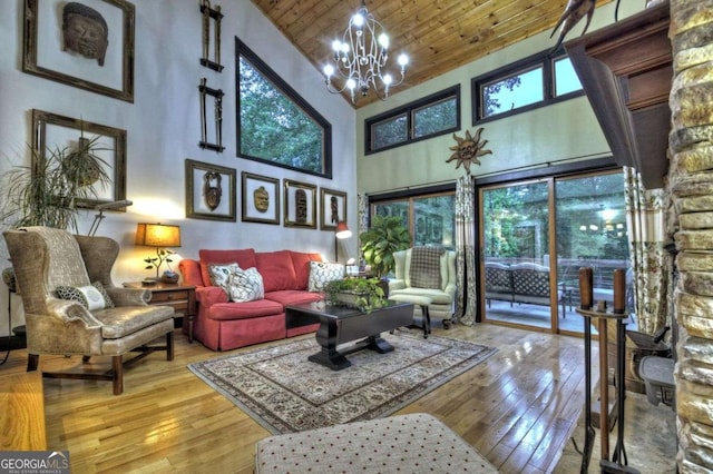 123 Old Fjord Rd, Blue Ridge, GA 30513 - living room with high vaulted ceiling, wooden ceiling, hardwood / wood-style flooring, and a chandelier