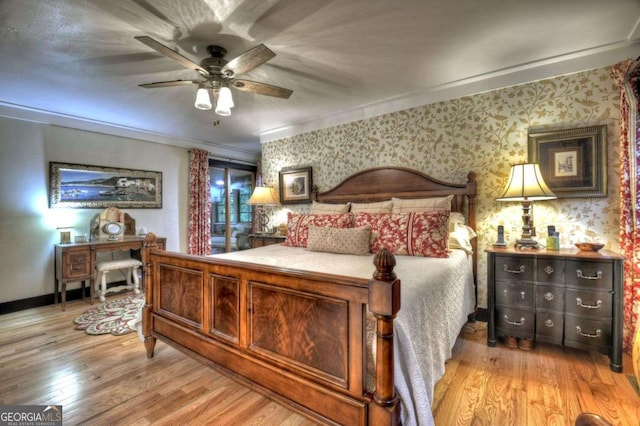 123 Old Fjord Rd, Blue Ridge, GA 30513 - bedroom featuring light wood-style flooring, crown molding, baseboards, ceiling fan, and wallpapered walls