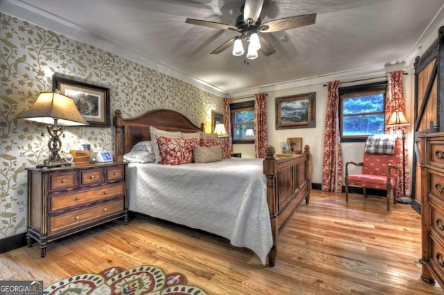 123 Old Fjord Rd, Blue Ridge, GA 30513 - bedroom featuring wallpapered walls, light wood-style floors, ornamental molding, and baseboards