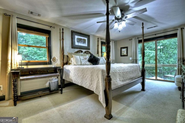 123 Old Fjord Rd, Blue Ridge, GA 30513 - carpeted bedroom featuring access to exterior, multiple windows, and a ceiling fan