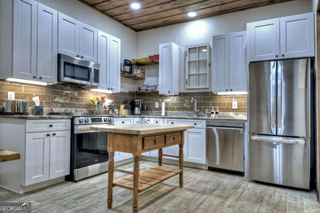 123 Old Fjord Rd, Blue Ridge, GA 30513 - kitchen featuring appliances with stainless steel finishes, light wood-style floors, a sink, recessed lighting, and wooden ceiling