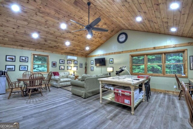 123 Old Fjord Rd, Blue Ridge, GA 30513 - living area with wood finished floors, ceiling fan, recessed lighting, baseboards, and a wall unit AC