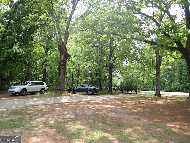 185 Kinards Mill Rd, Jackson, GA 30233 - view of yard featuring a forest view