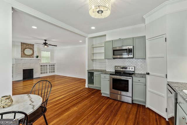 148 Jackson St, Newnan, GA 30263 - kitchen with stainless steel appliances, ceiling fan, dark wood-style floors, ornamental molding, and open shelves