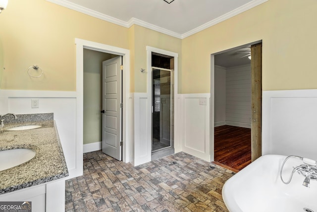 148 Jackson St, Newnan, GA 30263 - full bath with a shower stall, ornamental molding, a soaking tub, brick patterned flooring, and double vanity