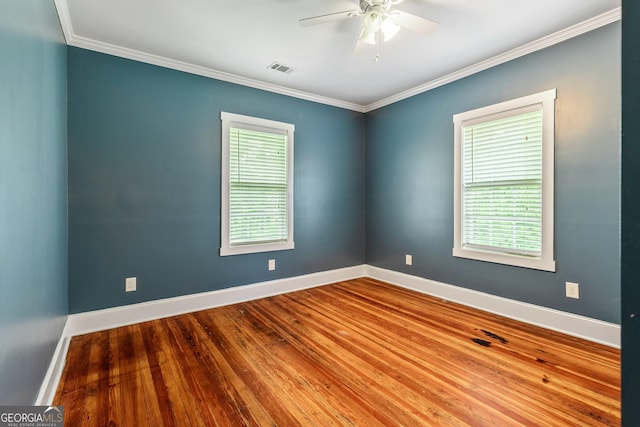 148 Jackson St, Newnan, GA 30263 - spare room featuring ceiling fan, ornamental molding, baseboards, and wood finished floors