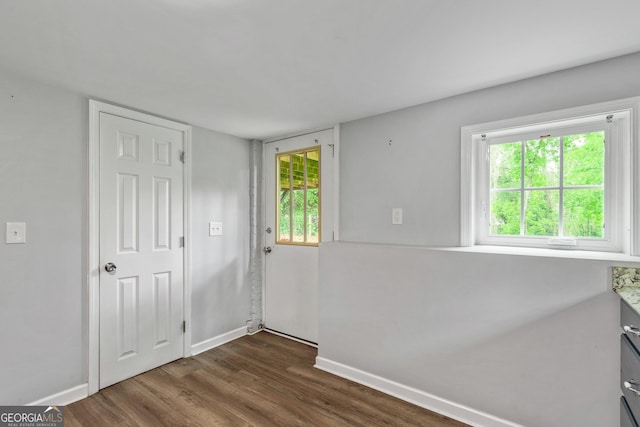 148 Jackson St, Newnan, GA 30263 - entryway featuring baseboards and dark wood-type flooring