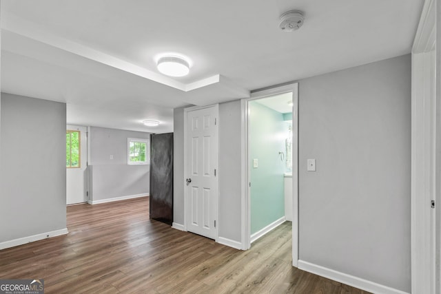 148 Jackson St, Newnan, GA 30263 - unfurnished room with wood finished floors, baseboards, and a smoke detector