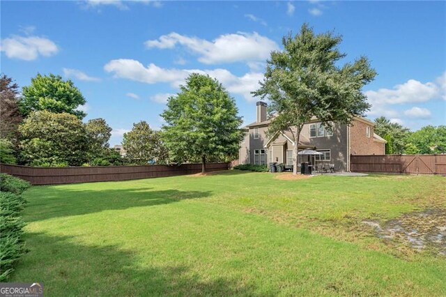 910 Ovalene Ln SW, Marietta, GA 30064 - view of yard with a patio area