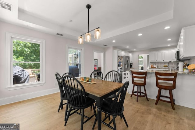 3652 Shady Oak Trl, Gainesville, GA 30506 - dining space featuring light wood finished floors, plenty of natural light, and recessed lighting