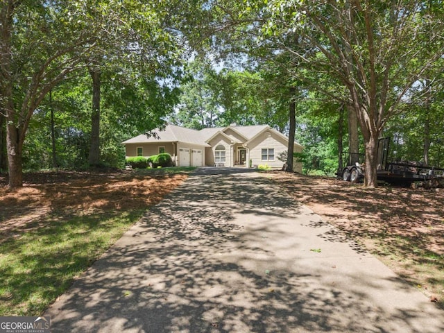 3652 Shady Oak Trl, Gainesville, GA 30506 - ranch-style home with asphalt driveway and a garage