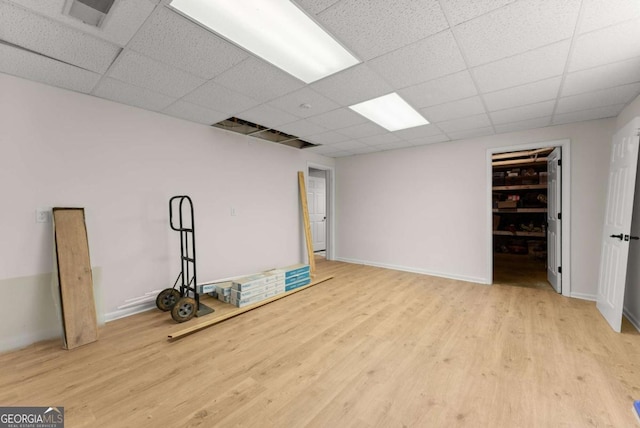 3652 Shady Oak Trl, Gainesville, GA 30506 - unfurnished living room with wood finished floors and a drop ceiling