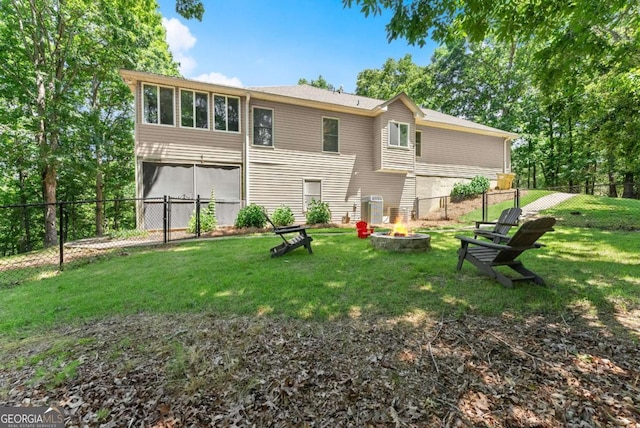 3652 Shady Oak Trl, Gainesville, GA 30506 - back of property featuring an outdoor fire pit and a fenced backyard