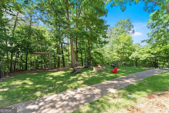 3652 Shady Oak Trl, Gainesville, GA 30506 - view of grassy yard with a fire pit