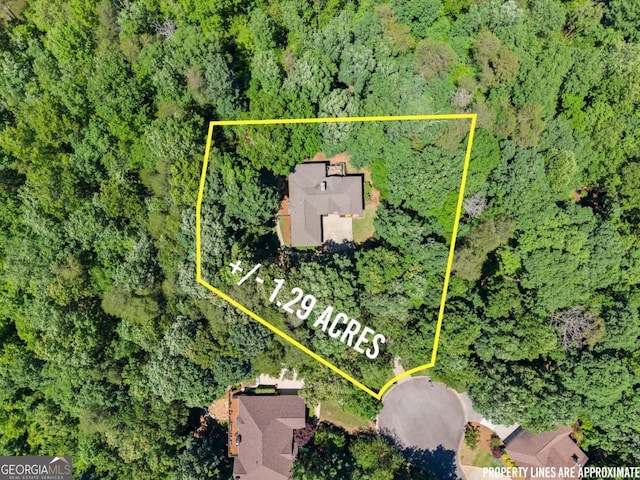 3652 Shady Oak Trl, Gainesville, GA 30506 - aerial view of property and surrounding area with property parcel outlined and a forest