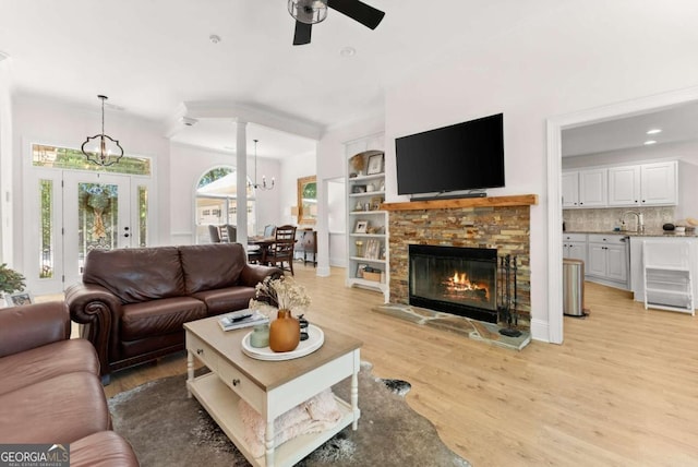 3652 Shady Oak Trl, Gainesville, GA 30506 - living room with ceiling fan, light wood-type flooring, a fireplace, a chandelier, and recessed lighting