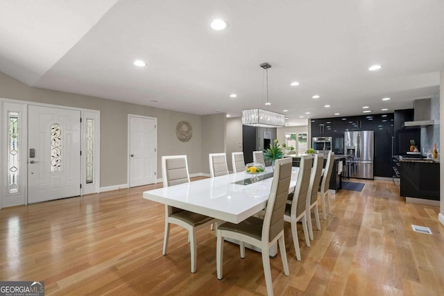 9701 Buice Rd, Alpharetta, GA 30022 - dining space with light wood-style floors, recessed lighting, and baseboards