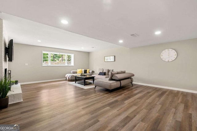 9701 Buice Rd, Alpharetta, GA 30022 - living room featuring wood finished floors, baseboards, and recessed lighting