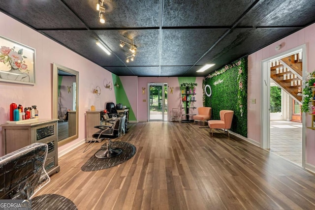 9701 Buice Rd, Alpharetta, GA 30022 - living area with wood finished floors, stairway, and baseboards