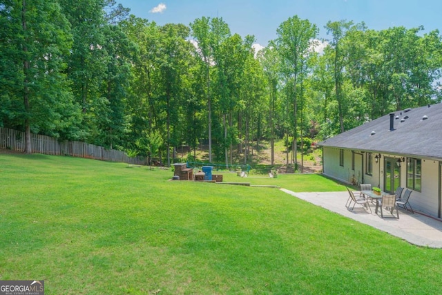 9701 Buice Rd, Alpharetta, GA 30022 - view of yard with a patio area