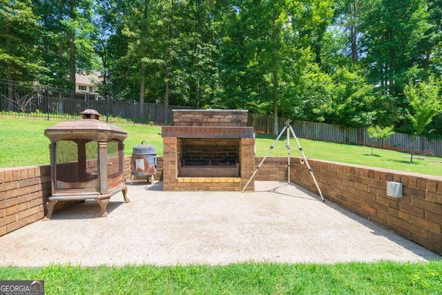 9701 Buice Rd, Alpharetta, GA 30022 - view of patio featuring exterior fireplace