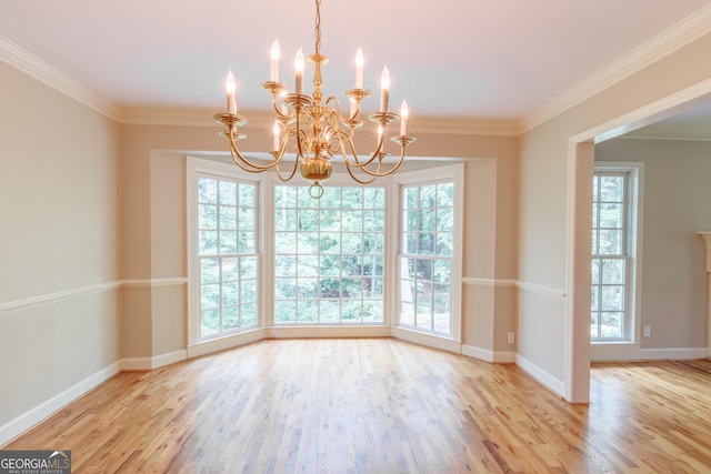 302 Brookwood Ln, Lafayette, GA 30728 - unfurnished room with a chandelier, plenty of natural light, wood finished floors, crown molding, and baseboards