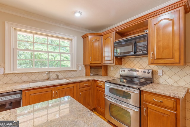 302 Brookwood Ln, Lafayette, GA 30728 - kitchen with range with two ovens, black microwave, a sink, light stone counters, and crown molding
