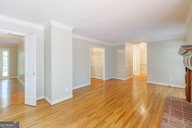 302 Brookwood Ln, Lafayette, GA 30728 - unfurnished living room featuring light wood-type flooring, baseboards, and ornamental molding