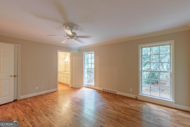 302 Brookwood Ln, Lafayette, GA 30728 - empty room with light wood-type flooring, healthy amount of natural light, ornamental molding, and ceiling fan