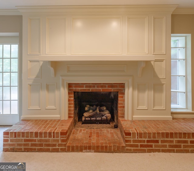 302 Brookwood Ln, Lafayette, GA 30728 - detailed view of crown molding, a fireplace, and carpet