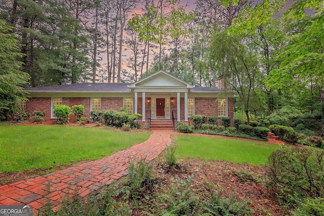 302 Brookwood Ln, Lafayette, GA 30728 - neoclassical / greek revival house featuring a yard, brick siding, a chimney, and covered porch