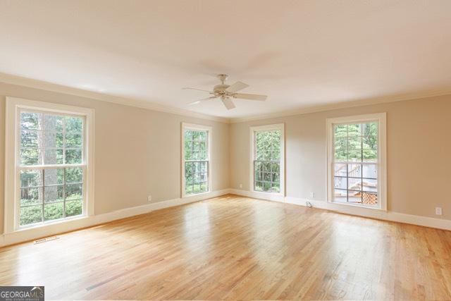302 Brookwood Ln, Lafayette, GA 30728 - unfurnished room with ornamental molding, light wood-style flooring, a ceiling fan, and baseboards