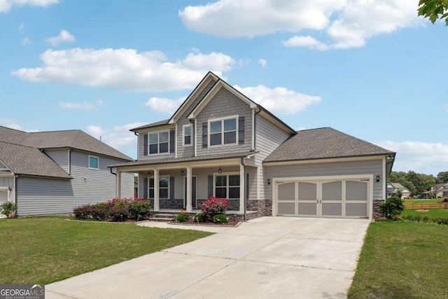 1824 Alberta Ln, Winder, GA 30680 - craftsman house with a porch, an attached garage, driveway, and a front lawn