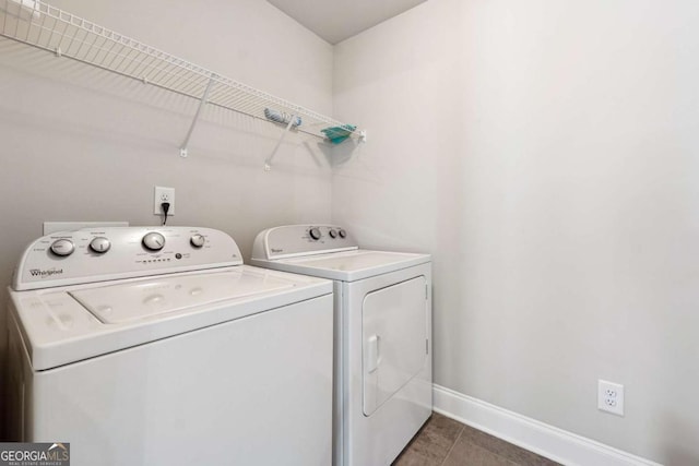 1824 Alberta Ln, Winder, GA 30680 - laundry area featuring washer and clothes dryer, baseboards, and tile patterned floors