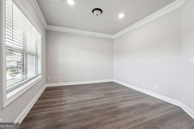 1824 Alberta Ln, Winder, GA 30680 - empty room with crown molding, dark wood-style flooring, recessed lighting, and baseboards