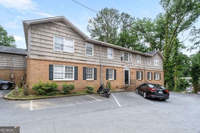 3626 Buford Hwy Unit C1, Brookhaven, GA 30329 - townhome / multi-family property with uncovered parking and brick siding