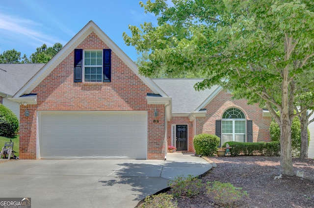 85 Parks Pl, Sharpsburg, GA 30277 - traditional-style home with concrete driveway, brick siding, and roof with shingles