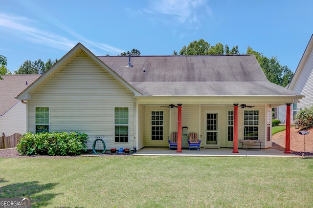 85 Parks Pl, Sharpsburg, GA 30277 - rear view of house featuring ceiling fan, a lawn, a patio, and roof with shingles
