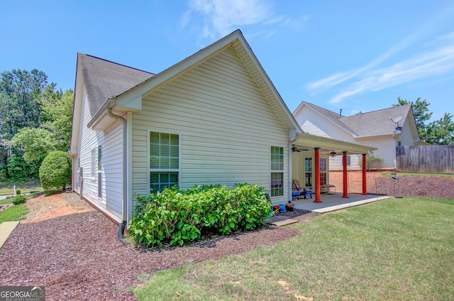 85 Parks Pl, Sharpsburg, GA 30277 - back of property with a ceiling fan and a patio