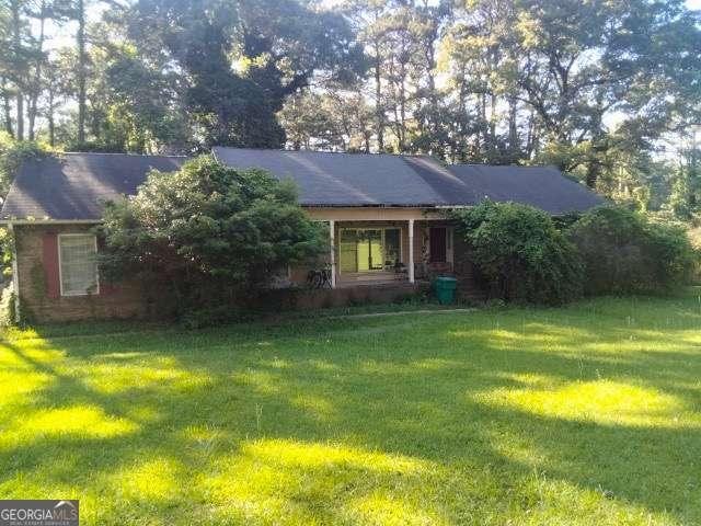 1627 Norden Rd, Riverdale, GA 30296 - view of front of home with a front yard