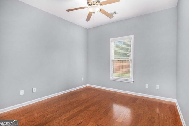 2023 Arbor Springs Way, Buford, GA 30519 - spare room with wood finished floors and a ceiling fan