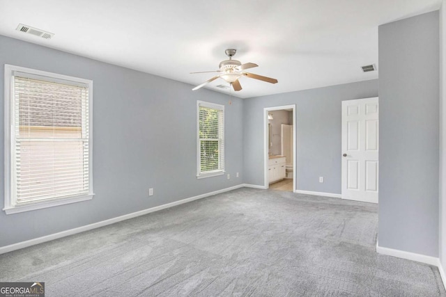 2023 Arbor Springs Way, Buford, GA 30519 - unfurnished bedroom with carpet, ensuite bath, and a ceiling fan