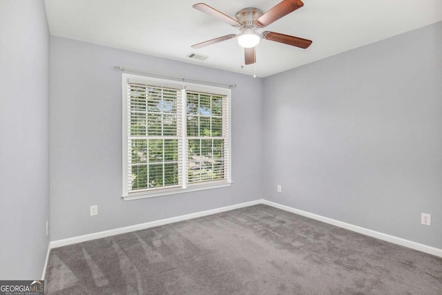 2023 Arbor Springs Way, Buford, GA 30519 - spare room featuring a ceiling fan and carpet flooring
