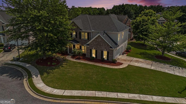 2023 Arbor Springs Way, Buford, GA 30519 - view of front of house with concrete driveway, a garage, and a front yard