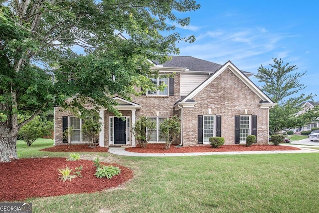 2023 Arbor Springs Way, Buford, GA 30519 - view of front of home with a front lawn and brick siding