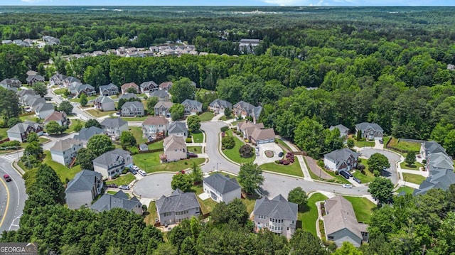 2023 Arbor Springs Way, Buford, GA 30519 - aerial overview of property's location with a forest and nearby suburban area