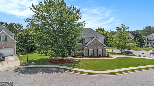 2023 Arbor Springs Way, Buford, GA 30519 - traditional home with driveway and a front lawn