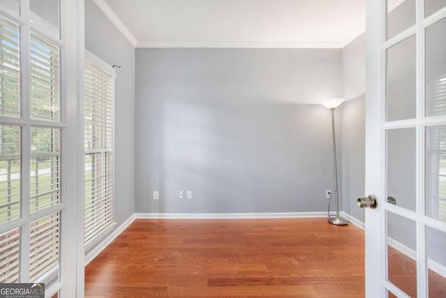 2023 Arbor Springs Way, Buford, GA 30519 - spare room with wood finished floors and crown molding