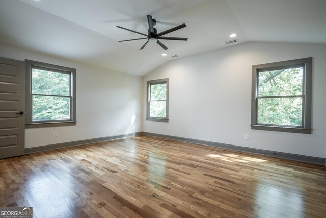 215 Holman Ave, Athens, GA 30606 - spare room with plenty of natural light, lofted ceiling, wood finished floors, a ceiling fan, and recessed lighting