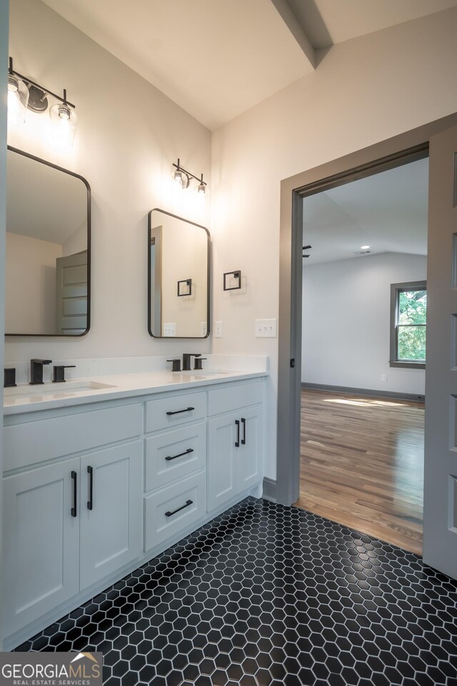 215 Holman Ave, Athens, GA 30606 - full bath featuring double vanity and wood finished floors